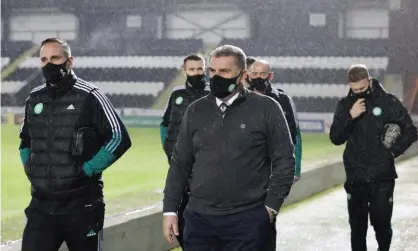  ?? Photograph: Steve Welsh/PA ?? The Celtic manager, Ange Postecoglo­u, arrives for the match at St Mirren on Wednesday. The hosts had a request to postpone the game turned down.