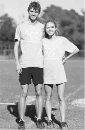  ?? STEPHEN M. DOWELL/ORLANDO SENTINEL ?? Winter Springs cross country runners Aiden Arn old and Caroline Wells won district championsh­ip races last weekend.