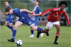  ?? ?? Co.fermanagh’s Aaron Ellis takes on Yuel Helafu. Photo by John Mcvitty