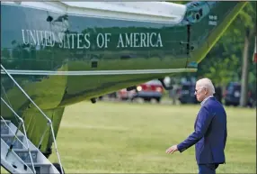  ?? (AP/Alex Brandon) ?? President Joe Biden walks to Marine One from the Ellipse at the White House on Saturday for a weekend trip to Camp David. He leaves behind a more relaxed White House staff.
