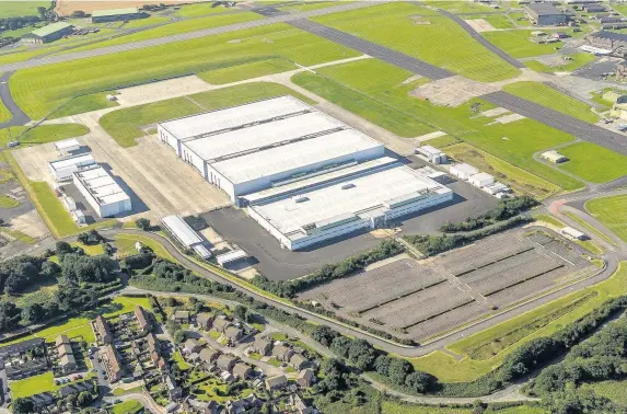  ?? Phillip Roberts/Welsh Government ?? > Aston Martin plans to refurbish its St Athan site