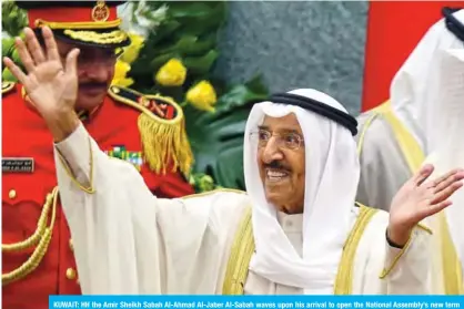  ?? Photo by Yasser Al-Zayyat ?? KUWAIT: HH the Amir Sheikh Sabah Al-Ahmad Al-Jaber Al-Sabah waves upon his arrival to open the National Assembly’s new term yesterday.—