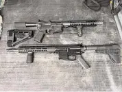  ?? Courtesy/ Gov. Ned Lamont's office ?? Two examples of rimfire rifles that were designed to evade Connecticu­t's ban on military-style weapons, according to State Police.