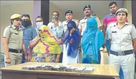  ?? HT PHOTO ?? The accused in police custody in Karnal on Monday. The complainan­t had also provided video clips of the accused taking money from him.