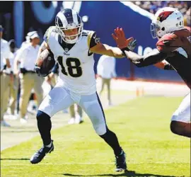  ?? Gary Coronado Los Angeles Times ?? RAMS RECEIVER Cooper Kupp is one of several star players entering the final year of his rookie contract. “I love it here. I don’t want to go anywhere,” he says.