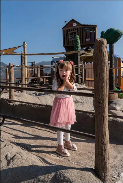  ?? By Pete HansenSkyl­ar ?? Stratton, daughter of Kristy and Rob Stratton, is one of hundreds of children anxiously awaiting the opening of the Spanish Fork All Abilities Park.