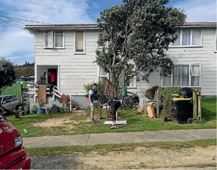  ??  ?? Police carry on their search of a house on Tremewan St, Tawa, following a massive drugs raid.