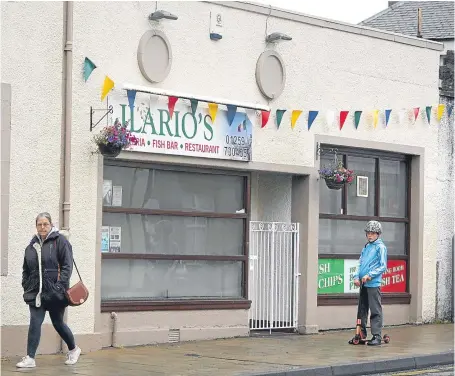  ?? Pictures: Kris Miller. ?? Staff and members of the public used extinguish­ers in an attempt to put out the fire.