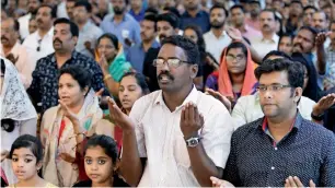  ??  ?? PRAYERS FOR ALL... People attend the Mass at the St. Michael’s Church in Sharjah.