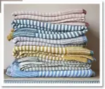  ??  ?? Easy knit throws, £135 each, Loaf