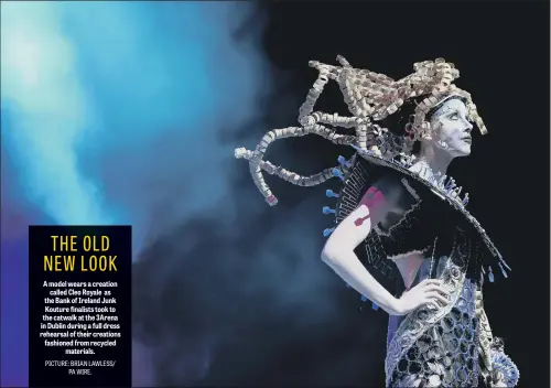  ??  ?? A model wears a creation called Cleo Royale as the Bank of Ireland Junk Kouture finalists took to the catwalk at the 3Arena in Dublin during a full dress rehearsal of their creations fashioned from recycled materials.