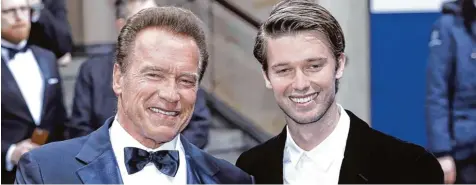  ?? Foto: Jörg Carstensen, dpa ?? Vater und Sohn: Arnold und Patrick Schwarzene­gger. Der will nun auch in Hollywood Karriere machen.