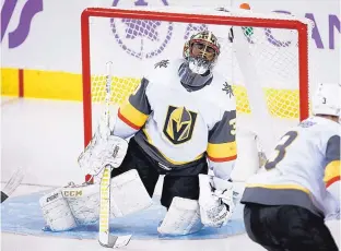  ?? JEFF MCINTOSH/THE CANADIAN PRESS VIA AP ?? Vegas goalie Malcolm Subban reacts after letting a goal in during the Golden Knights’ loss to the Calgary Flames Monday.