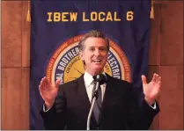  ?? Justin Sullivan / Getty Images ?? California Gov. Gavin Newsom speaks to union workers and volunteers on Election Day at the IBEW Local 6 union hall in San Francisco on Tuesday.