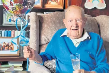  ??  ?? HEAD MAN: Former principal Joe Simpson celebratin­g his 100th birthday at home.