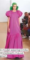  ??  ?? A model wearing Emilia Wickstead’s mauve gown.