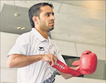  ?? HT PHOTO ?? ■
Boxer Amit Phangal, who has qualified for the Olympics, frets over maintainin­g fitness so that his hard work doesn’t go to waste.