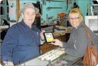  ??  ?? George W. Marinos with Lynn Morris at his Gettysburg shop