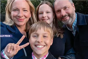  ?? ?? SALLY PECK
Swiss swap: Sally Peck with her children, Henry and Antonia, and husband, Giles. The family returned to London from Lausanne at Antonia’s insistence