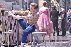  ??  ?? (Clockwise from top left) Seo Hye Han, a principal dancer with the Boston Ballet, performs the role of the Snow Queen in “The Nutcracker” at the Boston Opera House • Sage Humphries massages her legs • dancerDere­k Dunn applies rosin to his feet and...