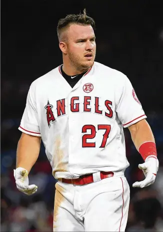 ?? BRIAN ROTHMULLER / ICON SPORTSWIRE VIA AP ?? Under the owners’ proposal, the major leagues’ best player, Mike Trout, and other stars should take salary reductions of around 70%.
