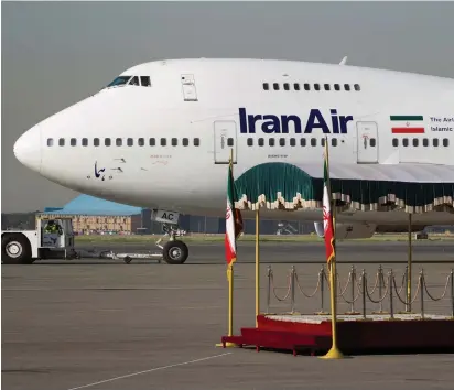  ?? (Reuters) ?? AN IRAN AIR Boeing 747 is pictured before leaving Tehran’s Mehrabad Airport in 2011.