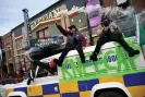  ?? ?? Kneecap and their PSNI jeep at Sundance film festival in Utah in January. Photograph: Michael Buckner/Deadline/Getty Images