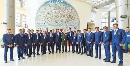  ?? PTI ?? Army Chief Vipin Rawat with Army sportsmen who won medals in the Commonweal­th Games 2018, at Manekshaw Centre in New Delhi yesterday. Seasoned Army boxer Satish hopes to go one better and bag gold at the Olympics.