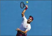  ?? ANDY WONG / ASSOCIATED PRESS ?? Roger Federer saved seven match points to beat Tennys Sandgren 6-3, 2-6, 2-6, 7-6 (8), 6-3 on Tuesday during their quarterfin­al match at the Australian Open in Melbourne.