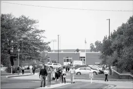  ??  ?? PEOPLE LEAVE MOLLIE TIBBETTS’ FUNERAL at Brooklyn-Guernsey-Malcom High School on Sunday in Brooklyn, Iowa. Cristhian Bahena Rivera is charged with first-degree murder in Tibbetts’ death. Authoritie­s have said Tibbetts was abducted while running in July, and an autopsy showed that she died from stab wounds.