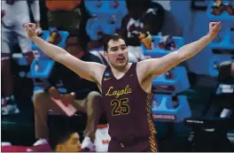  ?? PAUL SANCYA — THE ASSOCIATED PRESS ?? Loyola Chicago center Cameron Krutwig scored 19 points to lead the Ramblers in their upset victory over top-seeded Illinois in an NCAA Tournament second-round game.