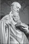  ??  ?? A sculpture of Saint Benedict on an altar, right, depicting the Adoration of the Magi is
part of an exhibit at Saint Vincent College of sculptures
and drawings by Brother Cosmas Wolf, a monk of the Saint Vincent Archabbey in
the mid-19th century.