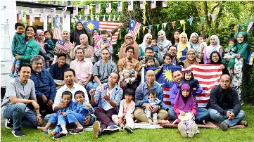  ??  ?? Some of the Malaysians in Copenhagen take a group photo in conjunctio­n with Hari Raya Aidiladha. — Bernama photo