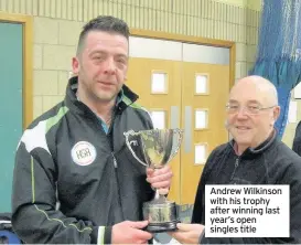  ??  ?? Andrew Wilkinson with his trophy after winning last year’s open singles title