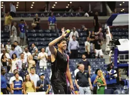  ?? THE NEW YORK TIMES ?? Ben Shelton gestures after winning his U.S. Open men’s singles quarterfin­al match against fellow American Frances Tiafoe early Wednesday morning.