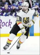  ??  ?? Alex Tuch swoops in Tuesday for his shootout goal, which gave the Golden Knights a 3-2 victory against the NHL’S best team in Tampa, Fla.