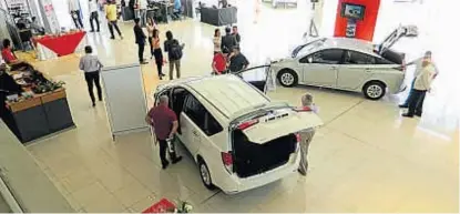  ??  ?? “Open Day”. El concesiona­rio Centro Motor presentó en Córdoba nuevos modelos de Toyota.