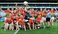  ??  ?? GLORY: Carlow’s players celebrate a third Christy Ring Cup