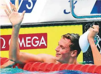  ?? AFP ?? Ukraine’s Mykhailo Romanchuk reacts after winning a 1,500m freestyle heat at the 2017 Fina World Championsh­ips in Budapest yesterday.