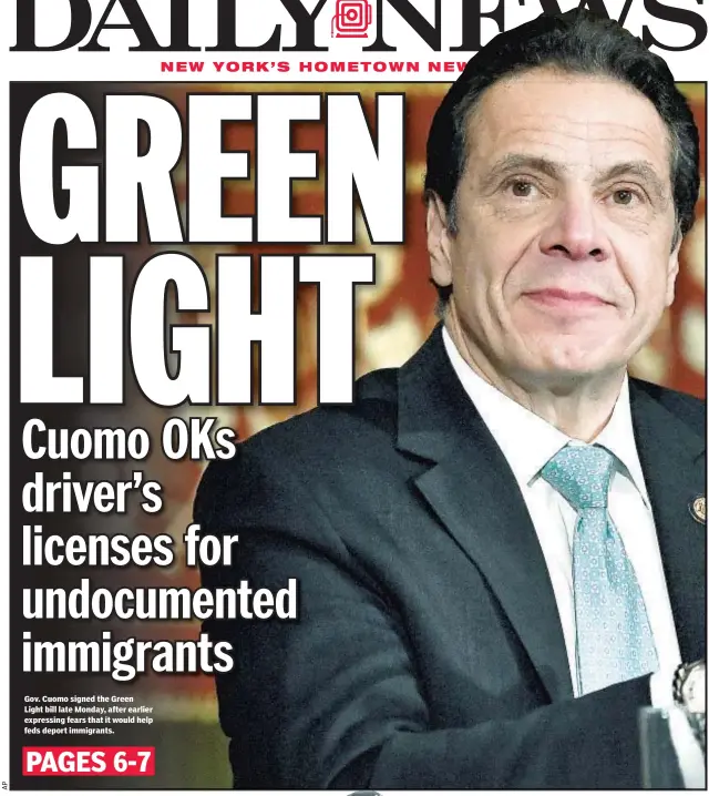  ??  ?? Gov. Cuomo signed the Green Light bill late Monday, after earlier expressing fears that it would help feds deport immigrants.