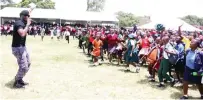  ?? ?? Musician Jah Prayzah performs to schoolchil­dren after educating them on the importance of taking their school seriously and also nurturing individual talents during a career guidance, grooming, etiquette and stay in school programme organised by First Lady Dr Auxillia Mnangagwa in Mashonalan­d East on Monday