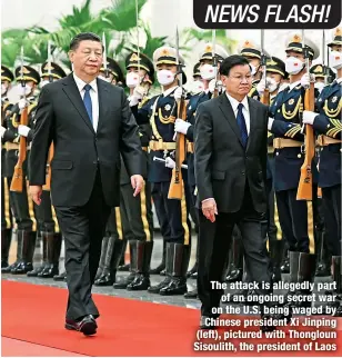  ?? ?? The attack is allegedly part
of an ongoing secret war on the U.S. being waged by Chinese president Xi Jinping (left), pictured with Thongloun Sisoulith, the president of Laos