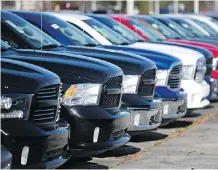  ?? JOHN BAZEMORE/THE ASSOCIATED PRESS FILES ?? Ram pickup trucks are shown in Morrow, Ga. The U.S. auto safety agency has opened a probe into rollaway complaints that are similar to those that prompted the recall of 1.1 million Jeep Grand Cherokees and other vehicles earlier this year.