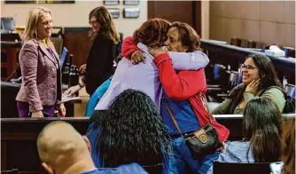  ?? Photos by Sam Owens/staff photograph­er ?? Prosecutor Marissa Giovenco, center left, hugs a relative of victim Mercedes Losoya late Monday after Jose Angel Ruiz was sentenced to life in prison for the 2022 death of the 5-year-old.