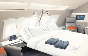  ??  ?? The new first-class suite on Singapore Airlines’ A380 superjumbo has a hotel room’s touch.