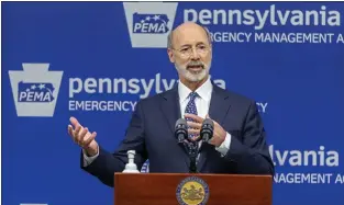  ?? ASSOCIATED PRESS ?? Pennsylvan­ia Gov. Tom Wolf meets with the media at The Pennsylvan­ia Emergency Management Agency headquarte­rs in May in Harrisburg.