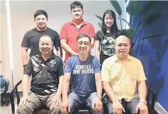  ??  ?? Organising chairman Allen Wong Siew Poh (seated centre) who is also the WFS president, coaches Yoong Thong Foong (seated left) and William Bong, organising secretary Lucas Lim Tee Kiat (seated right), competitio­n and technical chief Lau Hui Wei (left,...