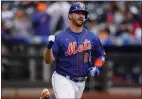  ?? FRANK FRANKLIN II — THE ASSOCIATED PRESS ?? The Mets' Pete Alonso had two hits in each game of Tuesday's doublehead­er sweep of the Braves. He had two RBI singles in Game 1.