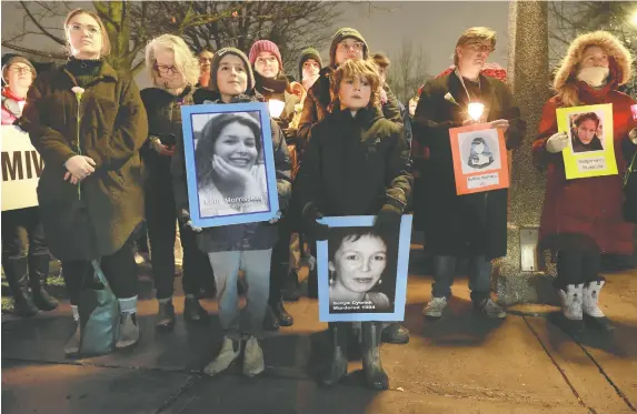  ?? TONY CALDWELL ?? A candleligh­t vigil at Minto Park on Tuesday night marks the 33rd anniversar­y of the massacre at École Polytechni­que in Montreal that senselessl­y took the lives of 14 women.