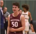  ?? STAN HUDY SHUDY@DIGITALFIR­STMEDIA.COM ?? Saratoga Springs grad and current Muhlenberg freshman basketball player Nick Chudy cheers on his teammates during introducti­ons prior to facing Skidmore College last weekend.